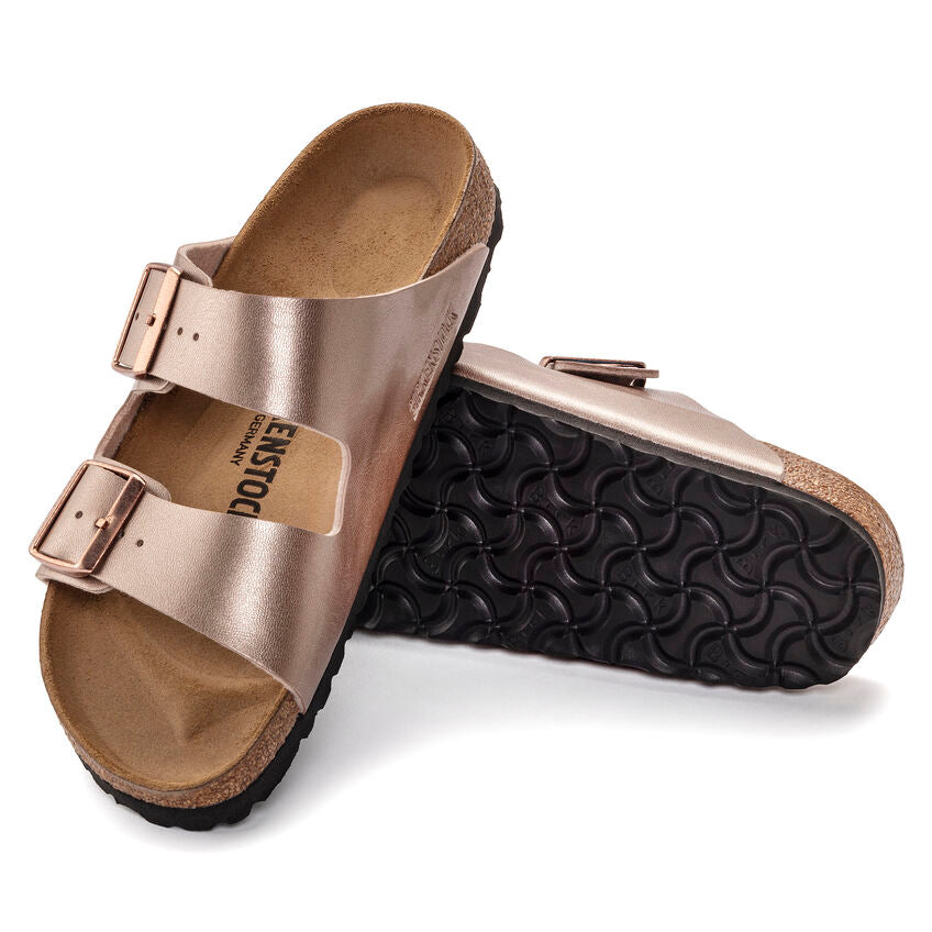 Birkenstock Arizona Birko-Flor Copper. An icon of timeless design and legendary comfort, the Arizona sandal comes in durable Birko-Flor for a classic, leather-like finish. Complete with signature design elements, like a contoured cork-latex footbed for the ultimate in support.