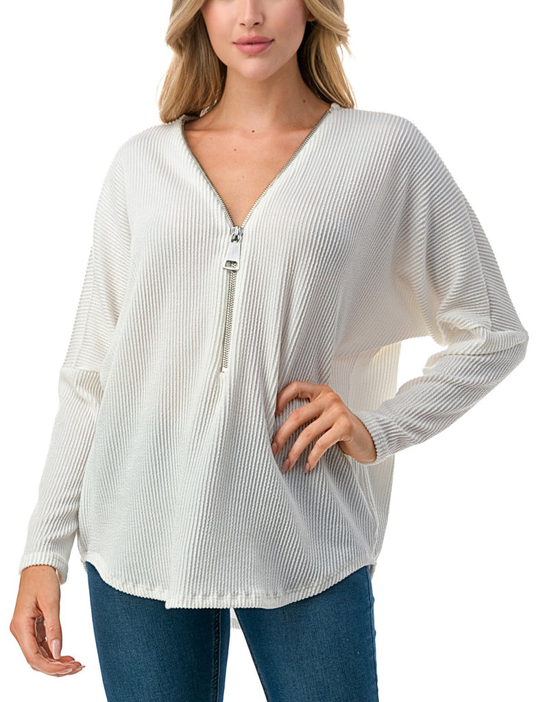Quinn Dolman Sleeve Zipper Top Ivory. This dolman sleeve zip top is the perfect everyday piece to add to your rotation, wear it with jeans or leggings for an effortless everyday look.
