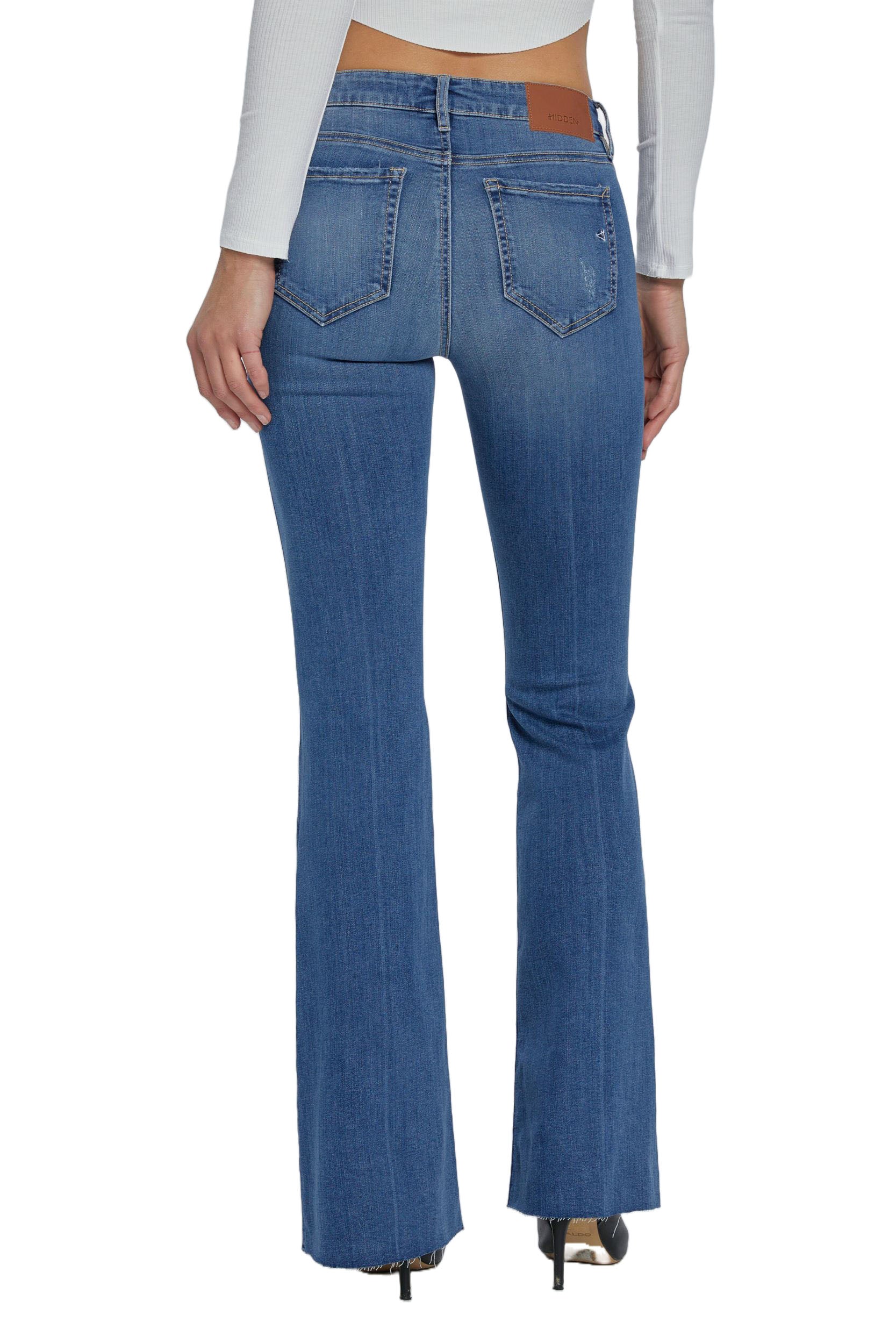 Hidden Happi Distressed Flare Medium Dark. These low rise stretch flare jeans feature subtle distressing at the knee and a medium wash, they pair perfect with any top, tee or sweater in your closet.