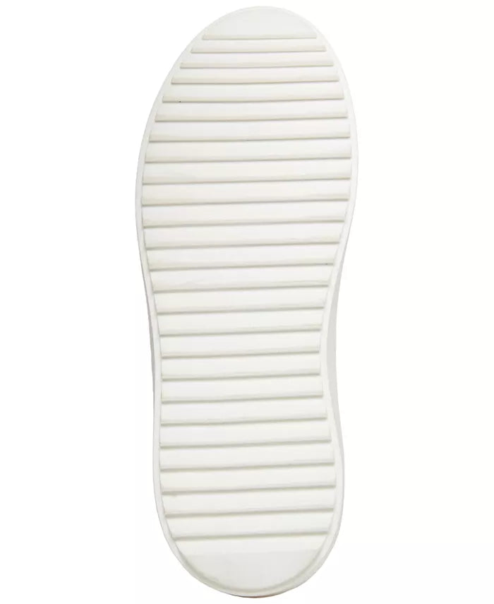 Steve Madden Charlie Sneaker White. A contrast accent at the counter interrupts the clean monochrome look of a street-chic sneaker elevated by a platform sole, perfect for everyday wear.