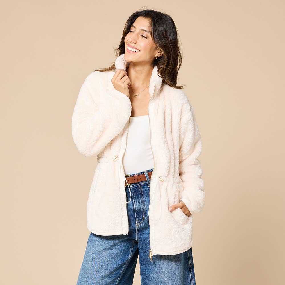 Women’s plush zip-up jacket with a stand collar, adjustable drawstring waist, front pockets, and curved hem.