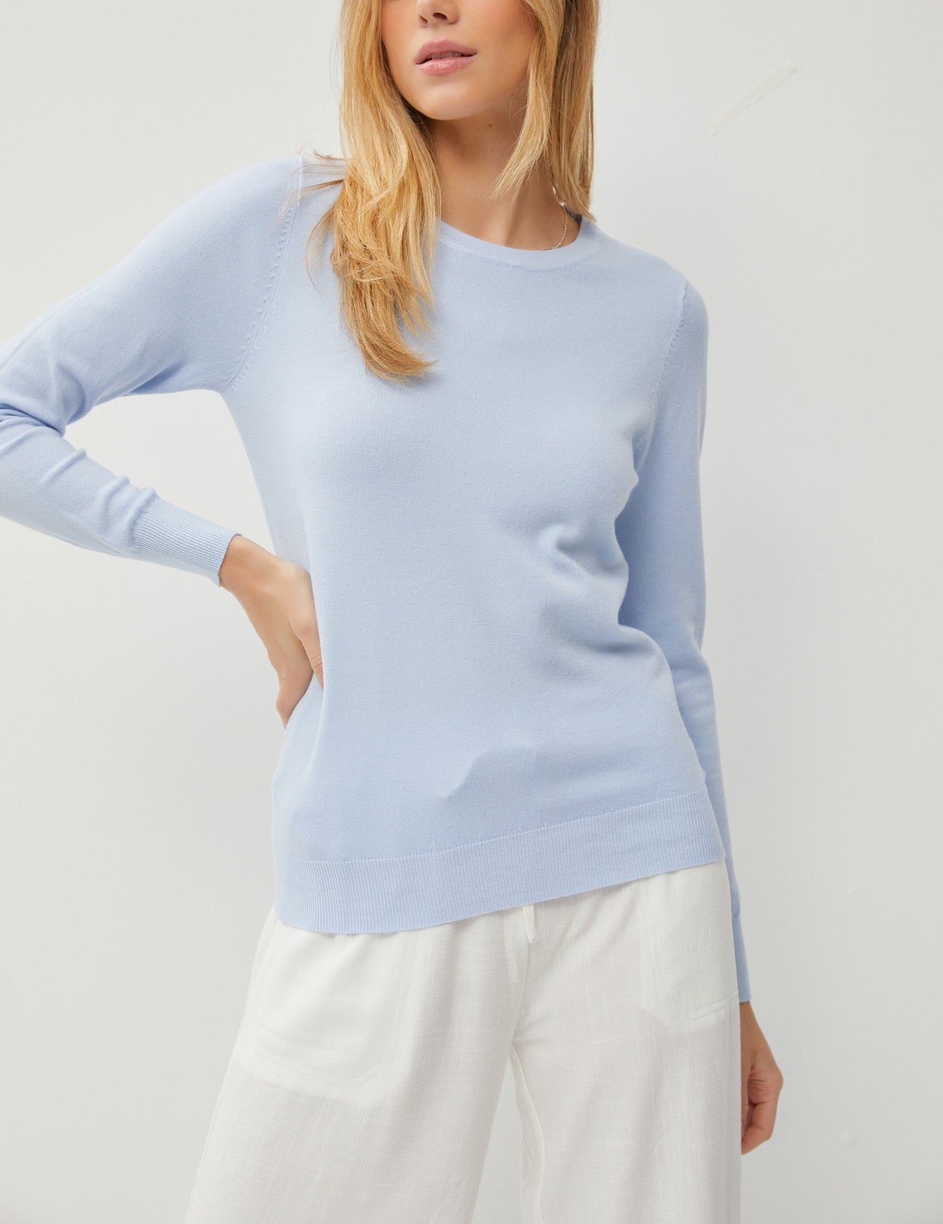 Gracelyn Classic Sweater Blue. This classic sweater features a round neckline and a super soft fabric, a must have basic to add to your closet for year round wear.