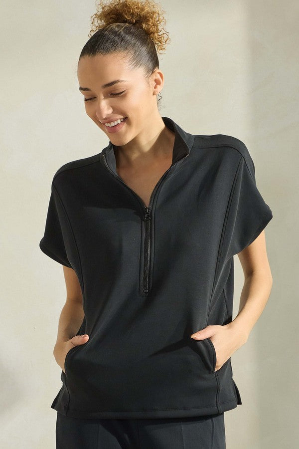 women’s half zip top, half zip pullover, athleisure top, sporty chic top, casual half zip top, women’s pullover top, relaxed fit top, everyday athleisure top, lightweight pullover, casual lounge top, modern athleisure top, women’s casual pullover, sporty lounge top, women’s zip neck top, boutique athleisure top