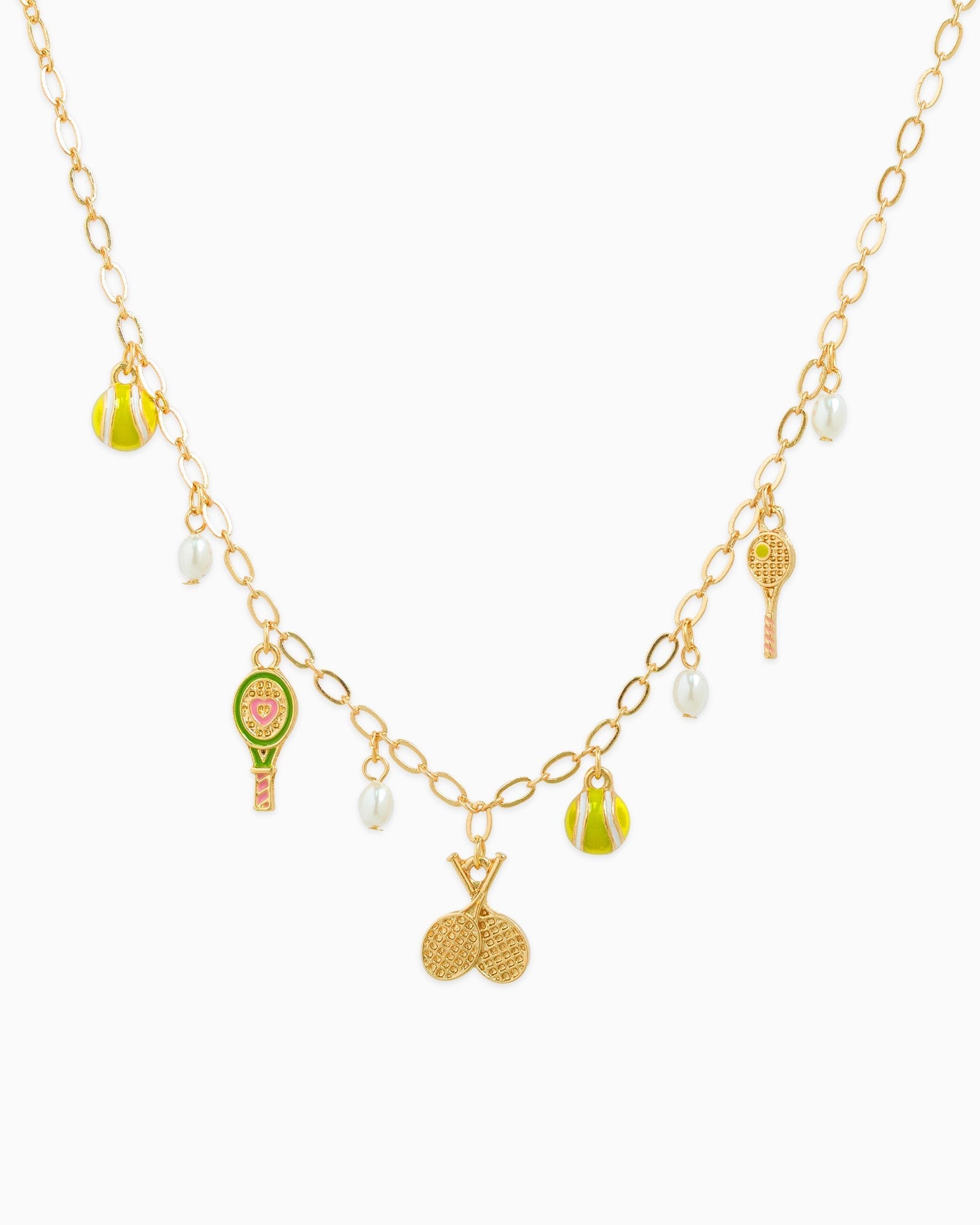 tennis charm necklace, tennis jewelry, tennis racket necklace, gold charm necklace, sporty chic jewelry, tennis lover gift, boutique charm necklace, women’s charm necklace, playful gold jewelry, statement charm necklace