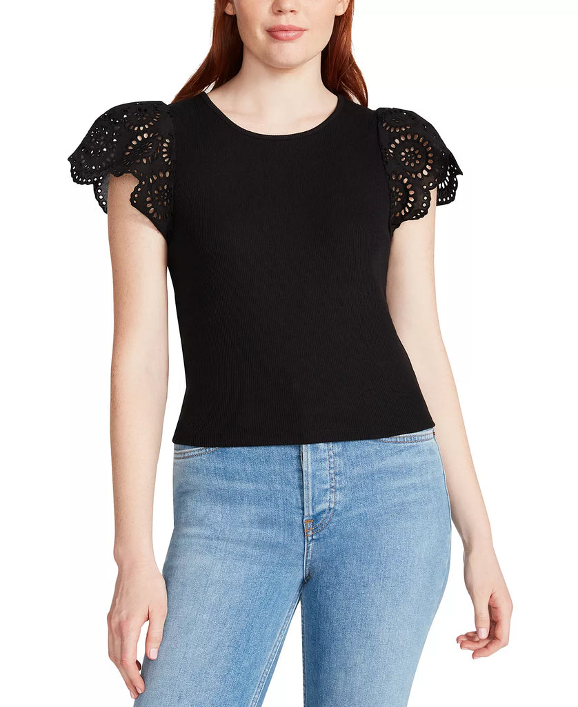 Steve Madden Olina Top Black. Voluminous flutter sleeves with dainty eyelets and a scalloped trim elevate this basic top boasting a slender allover ribbing and crew neckline.