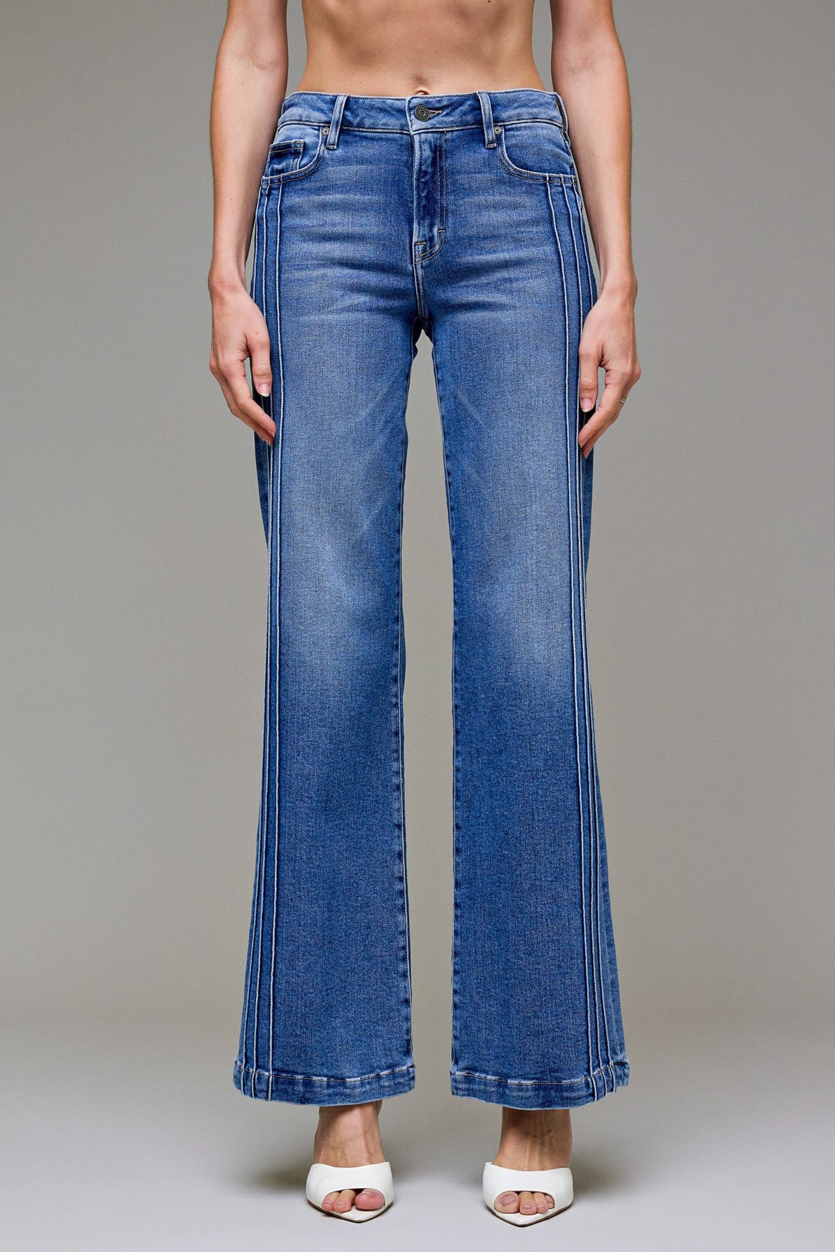 wide leg denim jeans, high rise wide leg jeans, statement denim pants, modern wide leg jeans, structured denim, elongating jeans, fashion forward denim, elevated everyday jeans, side panel jeans, women’s wide leg pants, trendy denim silhouette, polished casual denim