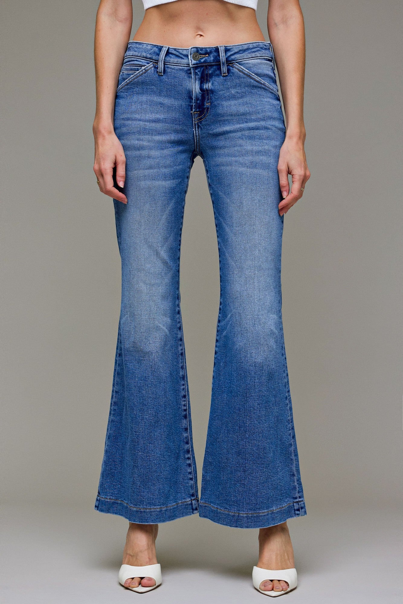 flare jeans women, high rise flare jeans, wide leg flare jeans, everyday denim jeans, retro inspired jeans, flattering flare jeans, casual jeans women, modern denim style, weekend wear jeans, women’s denim, casual essentials, easy everyday jeans