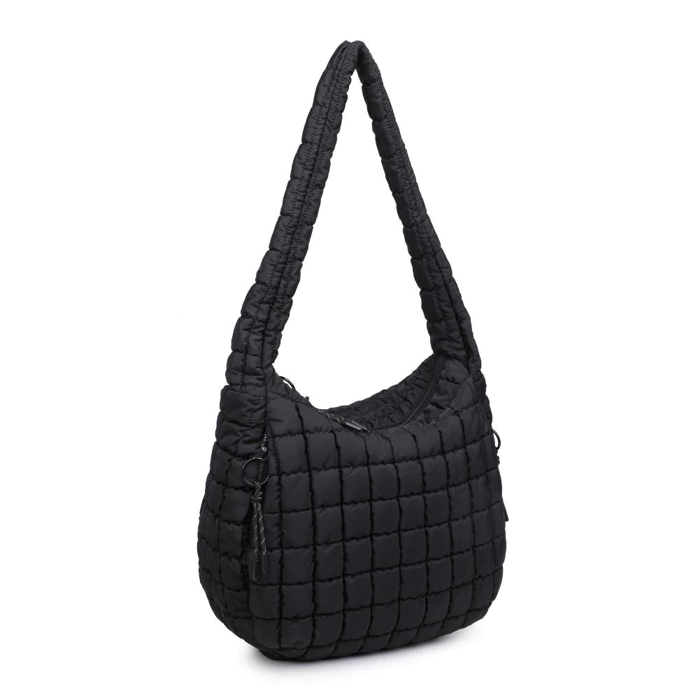 Sol & Selene Revive Tote Black. Revive your style with the Revive Tote. Crafted with utmost attention to detail, this chic and versatile bag combines functionality with a trendy design. Elevate your look and carry all your essentials in style with this must-have bag.
