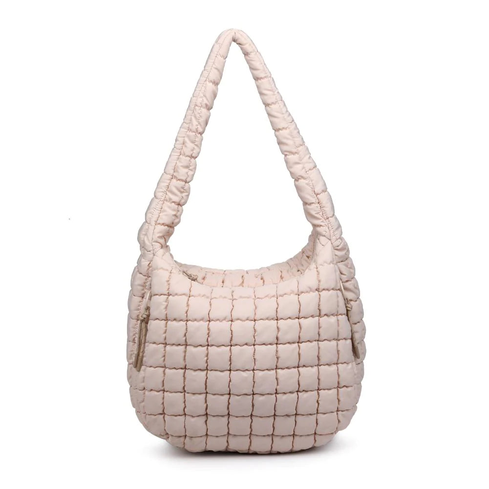 Sol & Selene Revive Tote Cream. Revive your style with the Revive Tote. Crafted with utmost attention to detail, this chic and versatile bag combines functionality with a trendy design. Elevate your look and carry all your essentials in style with this must-have bag.
