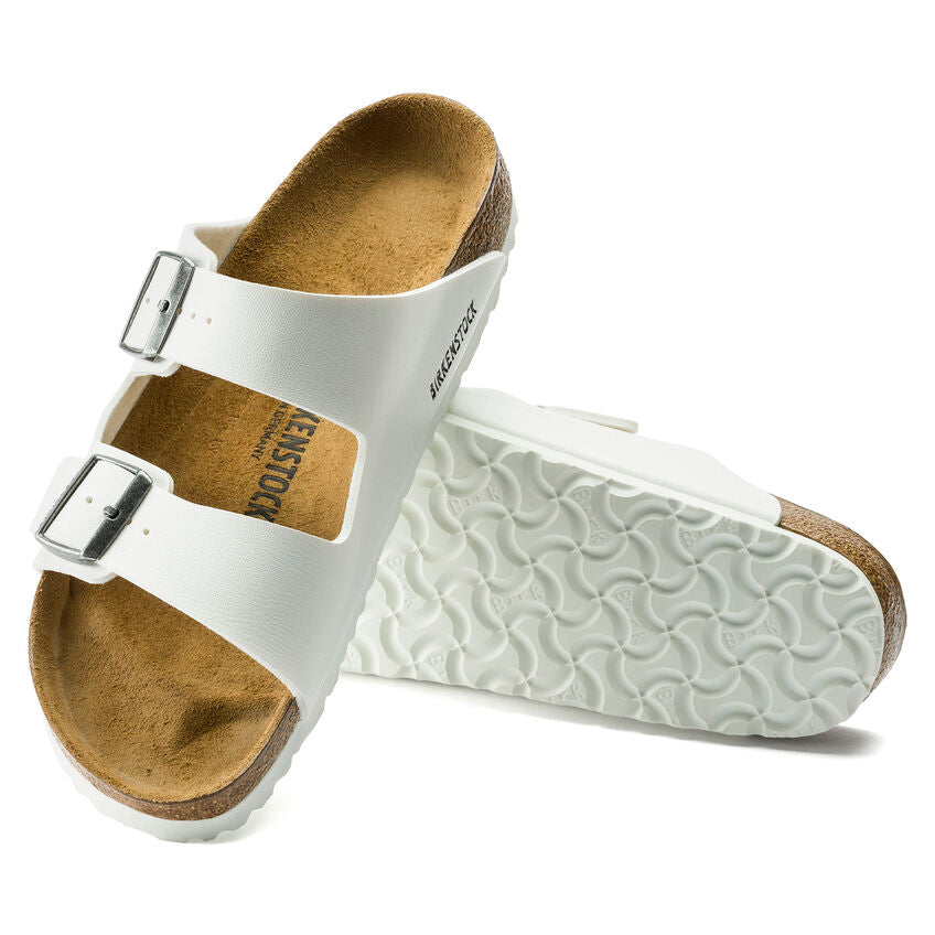 Birkenstock Arizona Birko-Flor White. An icon of timeless design and legendary comfort, the Arizona sandal comes in durable Birko-Flor for a classic, leather-like finish. Complete with signature design elements, like a contoured cork-latex footbed for the ultimate in support.