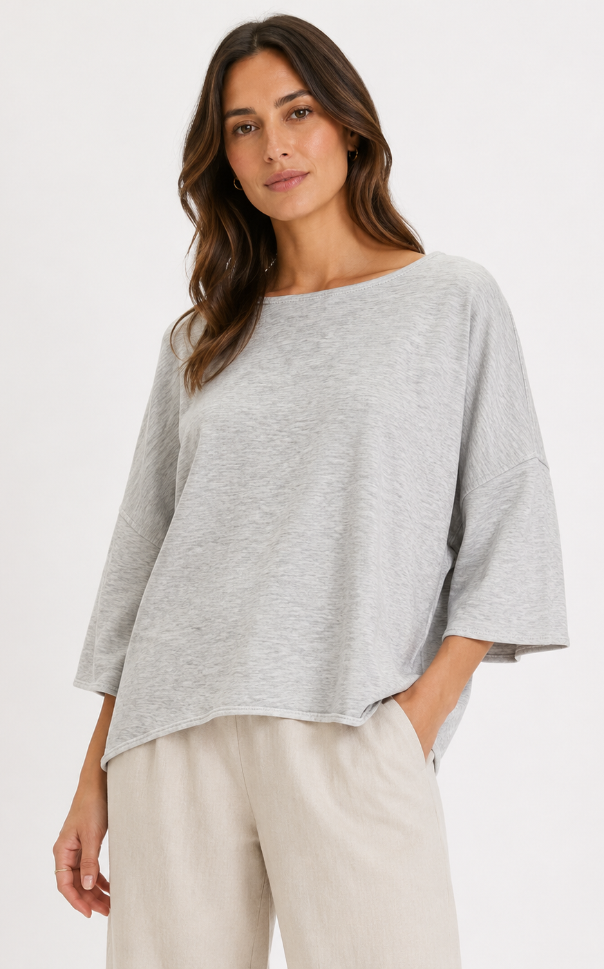 Relaxed fit lightweight knit top with wide sleeves and a drapey silhouette, styled with casual pants