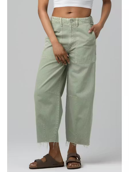 Wide leg denim jeans with a relaxed fit and vintage-inspired wash styled with a fitted top.