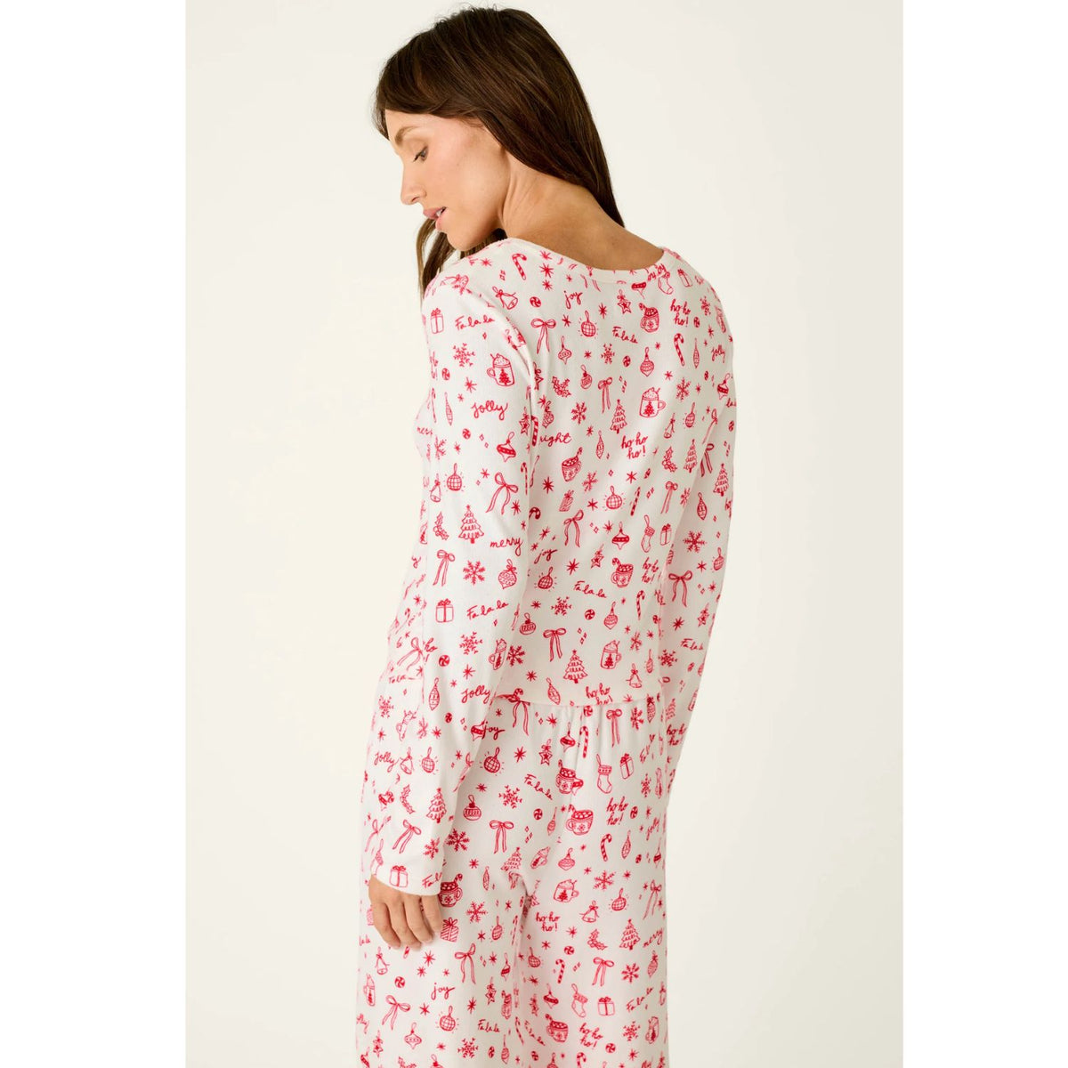 Ivory cropped pajama top with red Christmas print, scoop neckline, and long sleeves