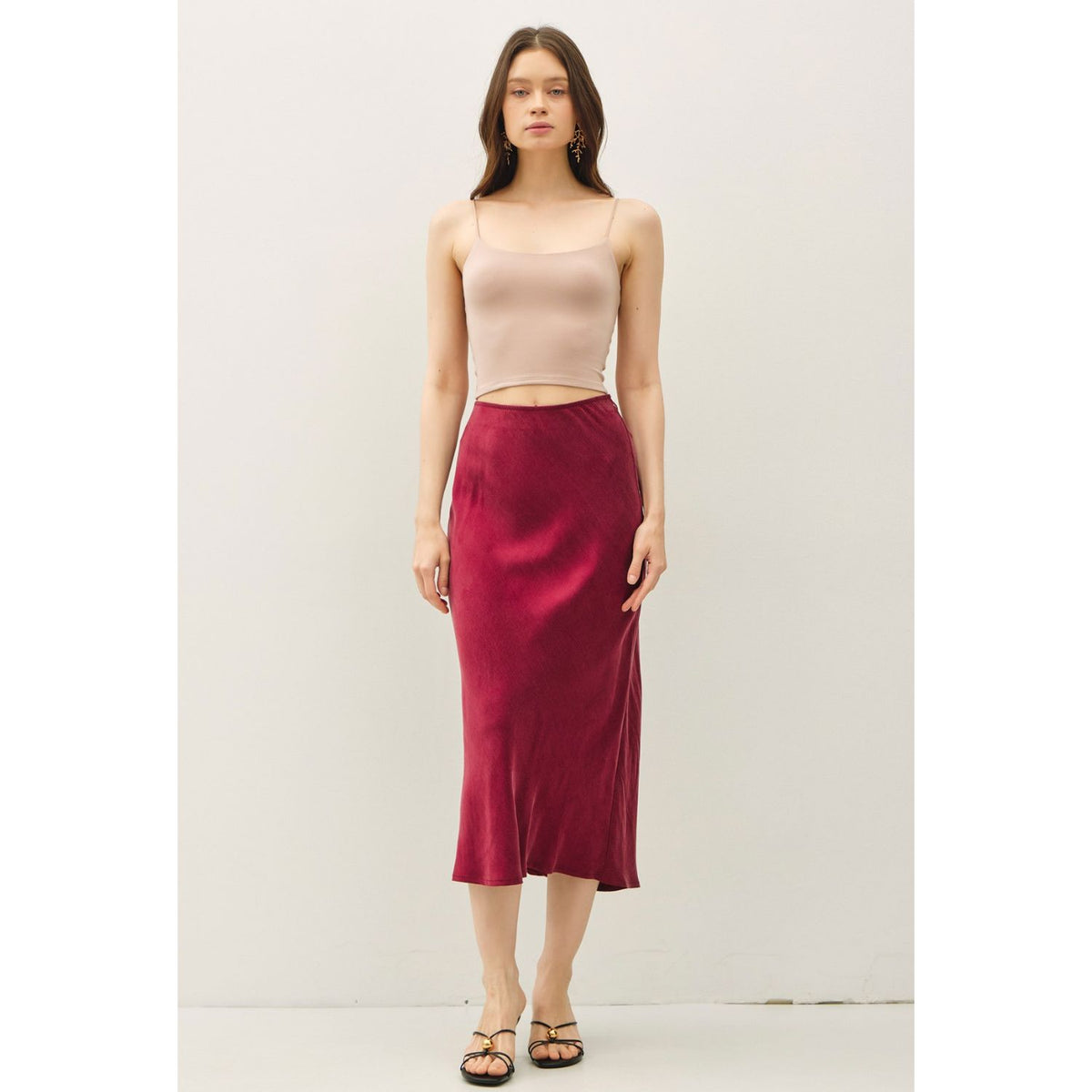 Women's suede-feel midi skirt with a high-rise elastic waistband, pull-on design, and flowing fit-and-flare silhouette