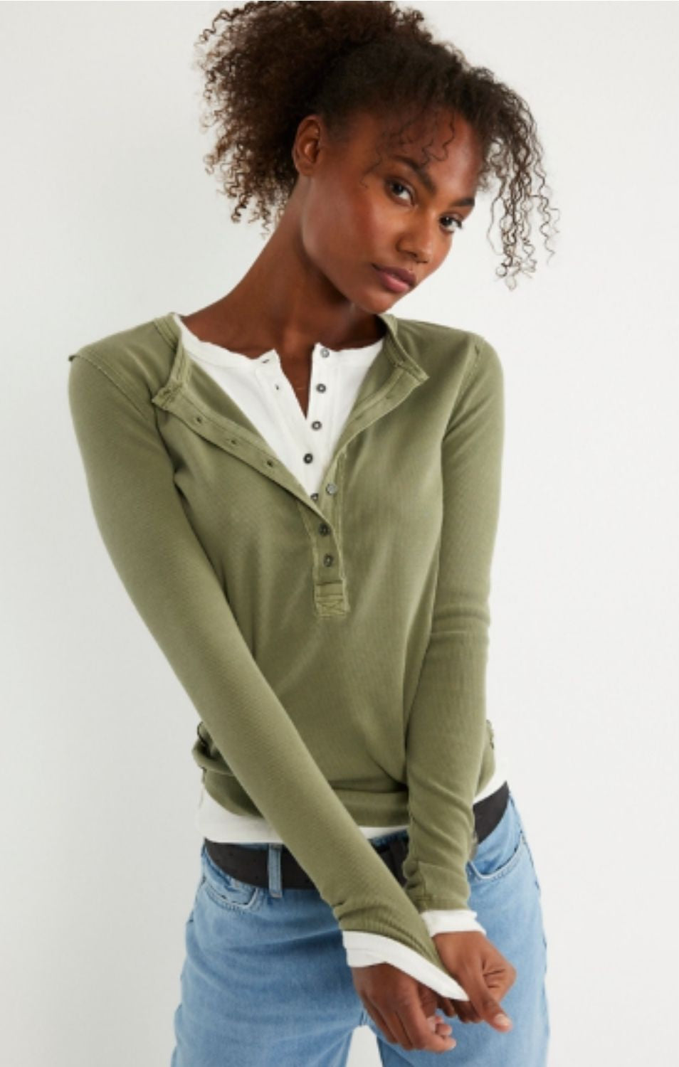 Free People Jamie Henley long-sleeve knit top featuring a slim fit, defined seams, and button-front detailing