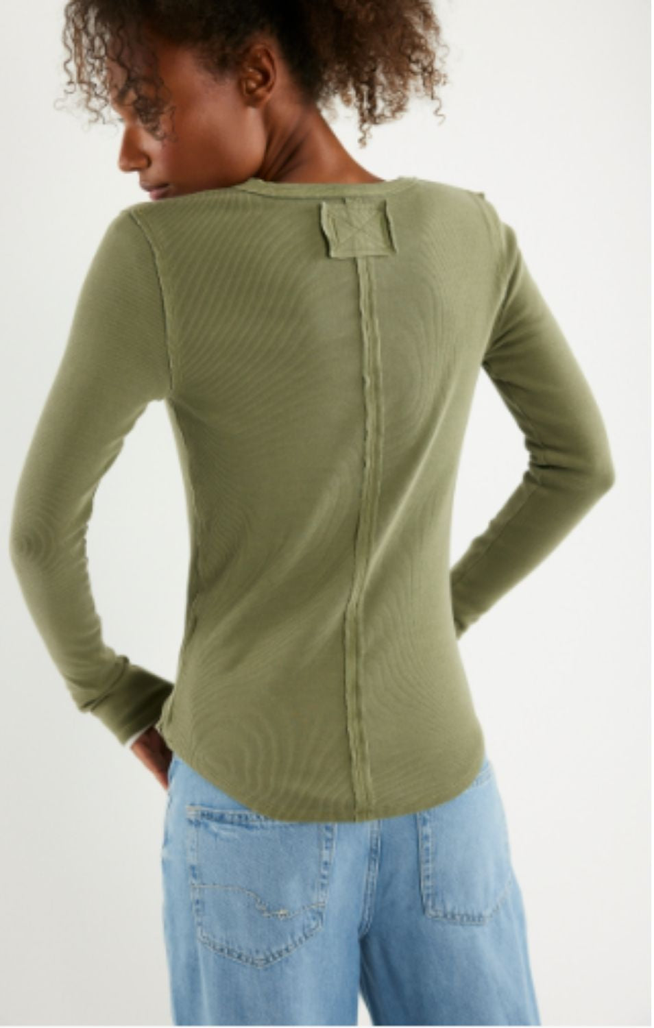 Free People Jamie Henley long-sleeve knit top featuring a slim fit, defined seams, and button-front detailing
