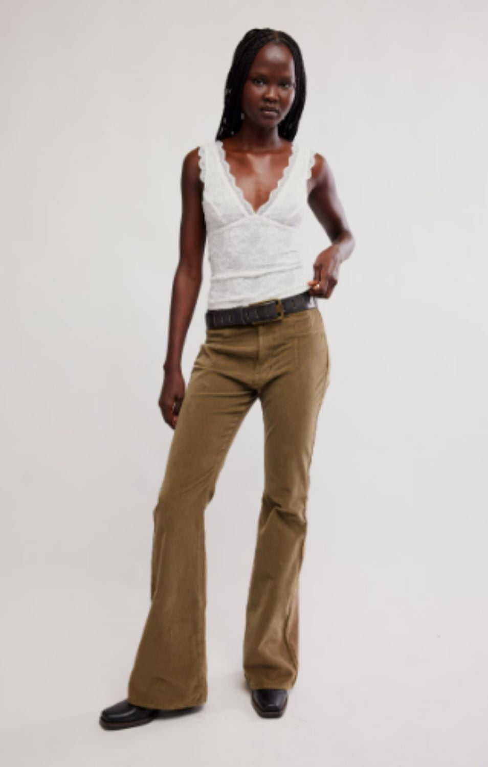 Women's lace tank top featuring a V-neckline, scalloped trim, and feminine open-back detailing