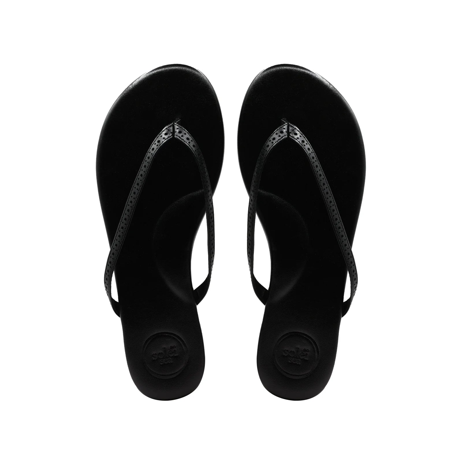 Solei Sea Indie UES Sandal Black. The cushioned footbed, padded arch support, non-slip rubber bottoms and water-resistant vegan leather pack these sandals with the versatility to seamlessly wear to the beach, brunch or anywhere in between.