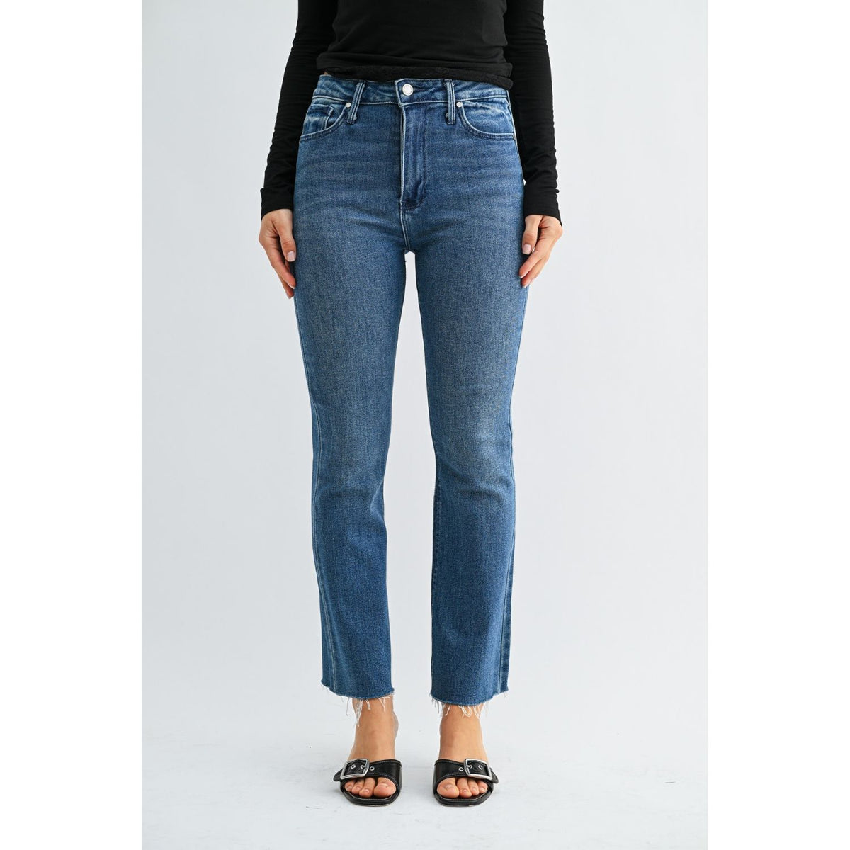 High-Rise Cropped Demi Flare Jeans feature a flattering slim fit through the hips and thighs, with a gently flared leg and cropped length for a modern, stylish silhouette.