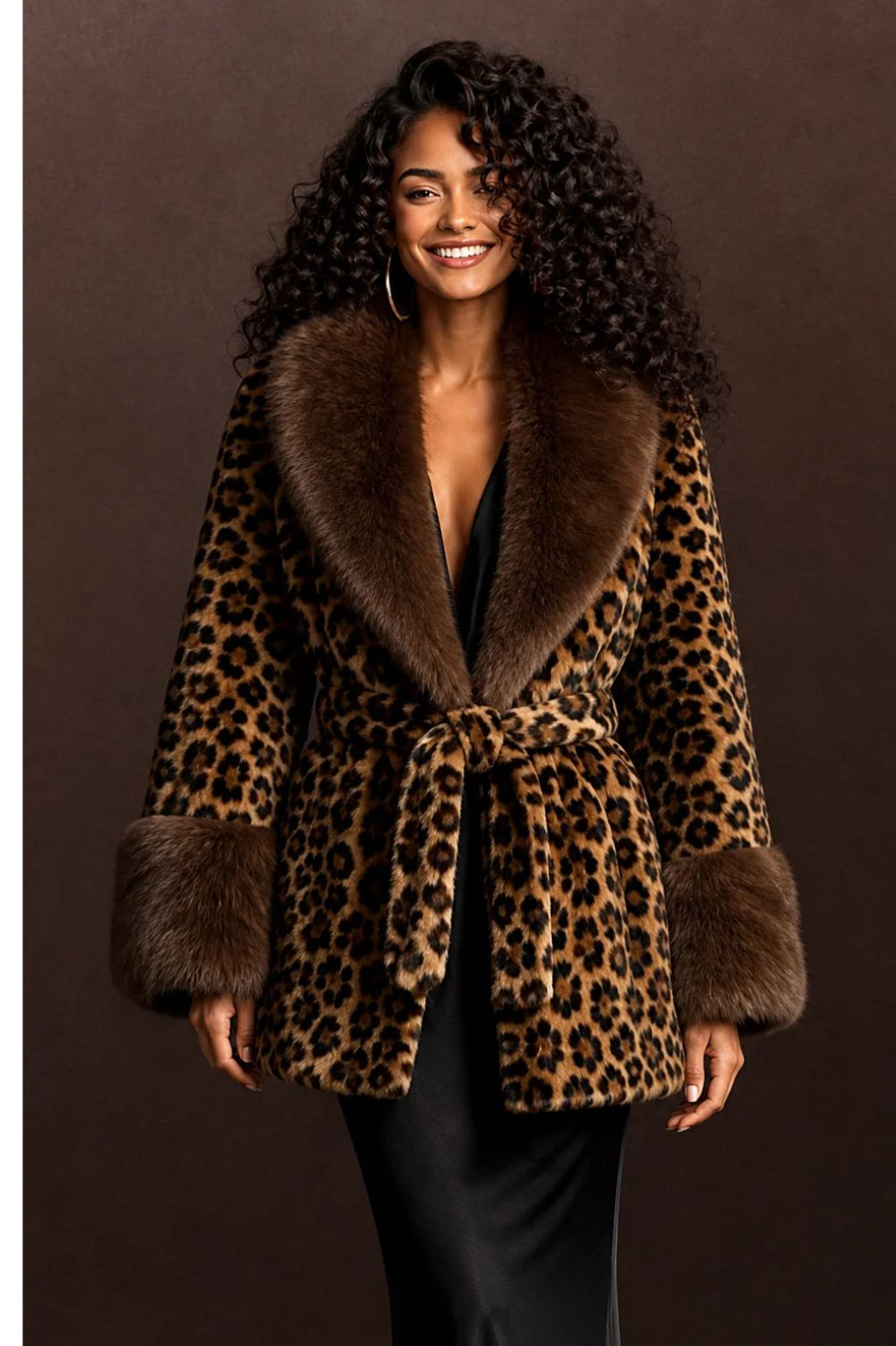 Leopard print faux fur wrap coat with brown shawl collar, fur cuffs, and self-tie belt.
