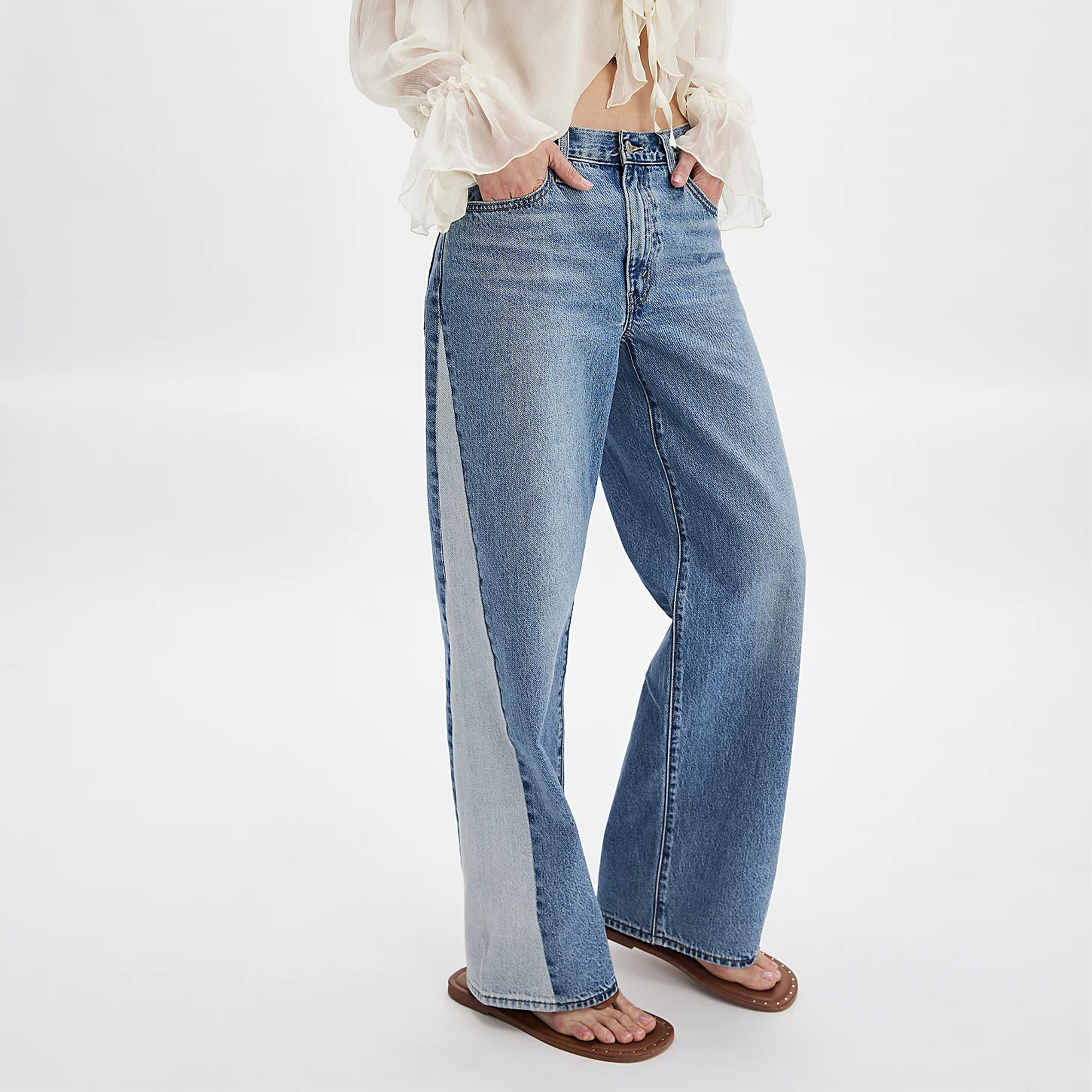Our Baggy Dad Pieced Jeans are the perfect blend of comfort and style, offering that classic borrowed-from-dad look—only with a modern twist. Featuring a mid-rise fit and straight leg, these relaxed jeans provide extra room for a flattering silhouette with a touch of edge. Whether you're rocking them with your favorite sneakers or pairing them with a casual tee, this versatile pair delivers that effortless ‘90s-inspired vibe all week long. Ideal for a laid-back yet stylish outfit, these jeans are a must-hav