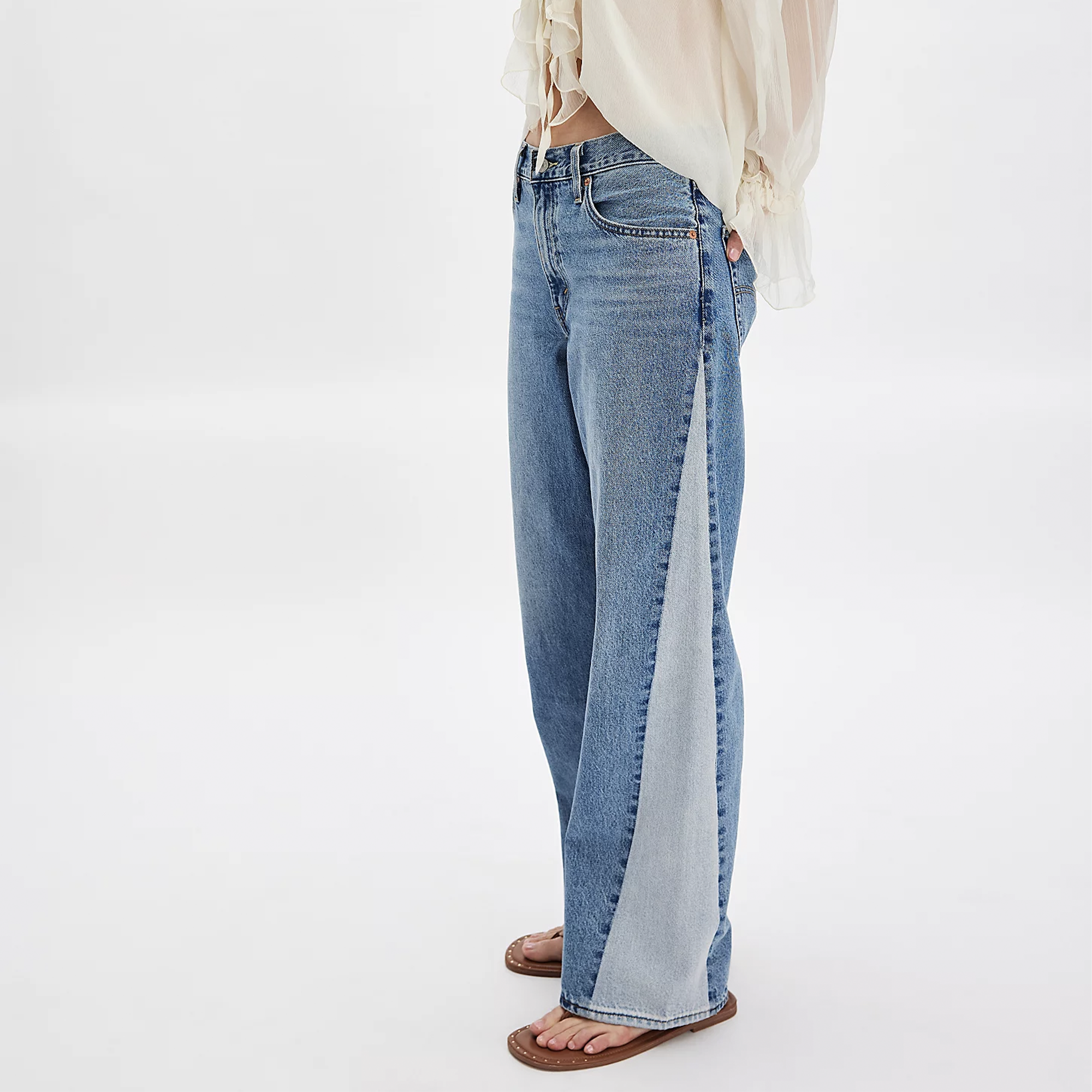 Our Baggy Dad Pieced Jeans are the perfect blend of comfort and style, offering that classic borrowed-from-dad look—only with a modern twist. Featuring a mid-rise fit and straight leg, these relaxed jeans provide extra room for a flattering silhouette with a touch of edge. Whether you're rocking them with your favorite sneakers or pairing them with a casual tee, this versatile pair delivers that effortless ‘90s-inspired vibe all week long. Ideal for a laid-back yet stylish outfit, these jeans are a must-hav