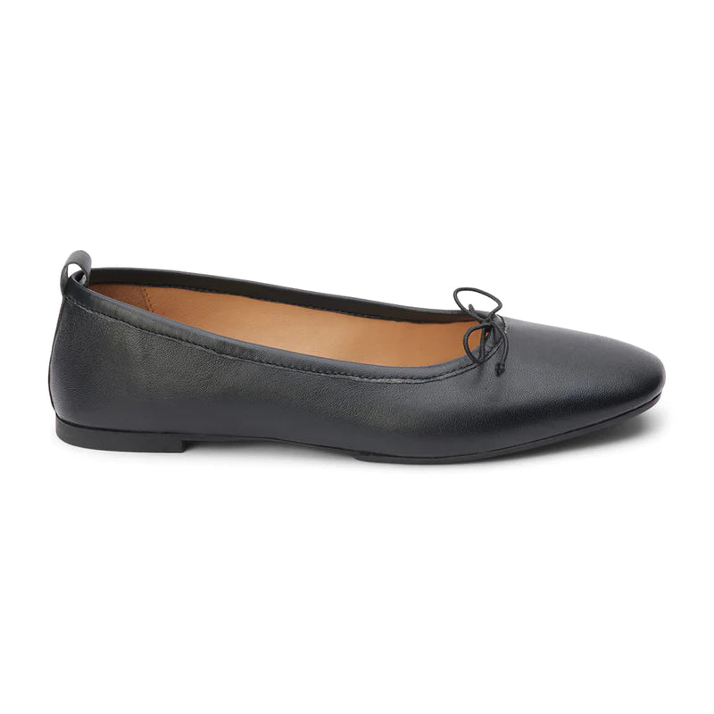 Coconut by Matisse Nikki Ballet Flat Black. These classic ballet flats feature a soft leather design with a small bow detail and slip on style perfect for all day comfort when you're on the go.