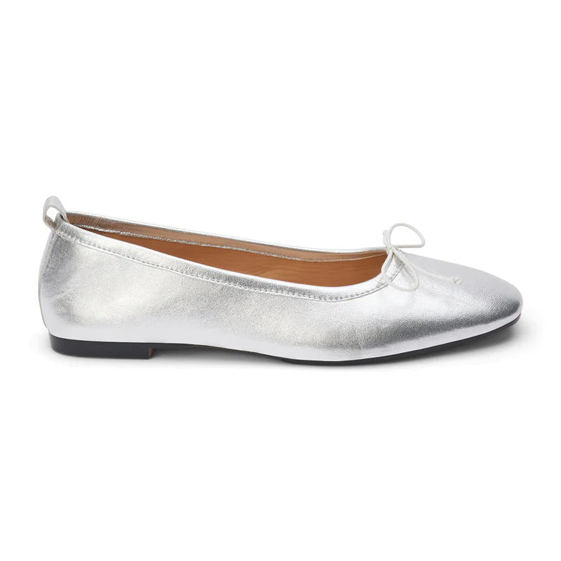 Coconut by Matisse Nikki Ballet Flat Silver. These classic ballet flats feature a soft leather design with a small bow detail and slip on style perfect for all day comfort when you're on the go.