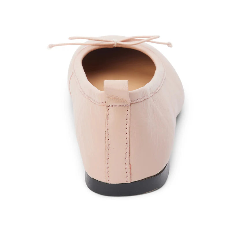 Coconut by Matisse Nikki Ballet Flat Nude. These classic ballet flats feature a soft leather design with a small bow detail and slip on style perfect for all day comfort when you're on the go.