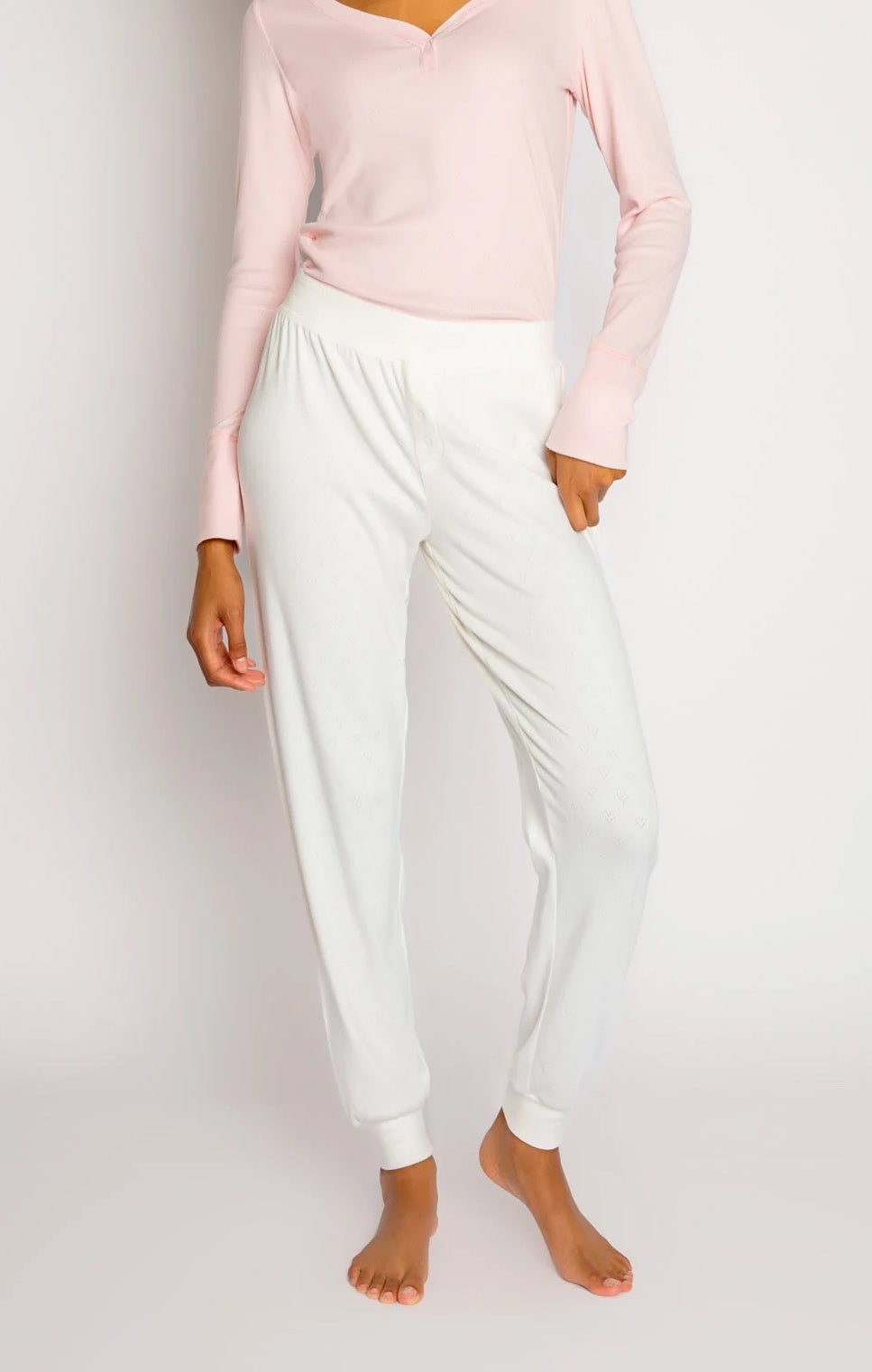 PJ Salvage Pointelle Hearts Pant Ivory. Rest easy in these brushed pajama pants, especially in an incredibly soft pointelle pattern, featuring mini hearts and banded cuffs with mini faux button fly.
