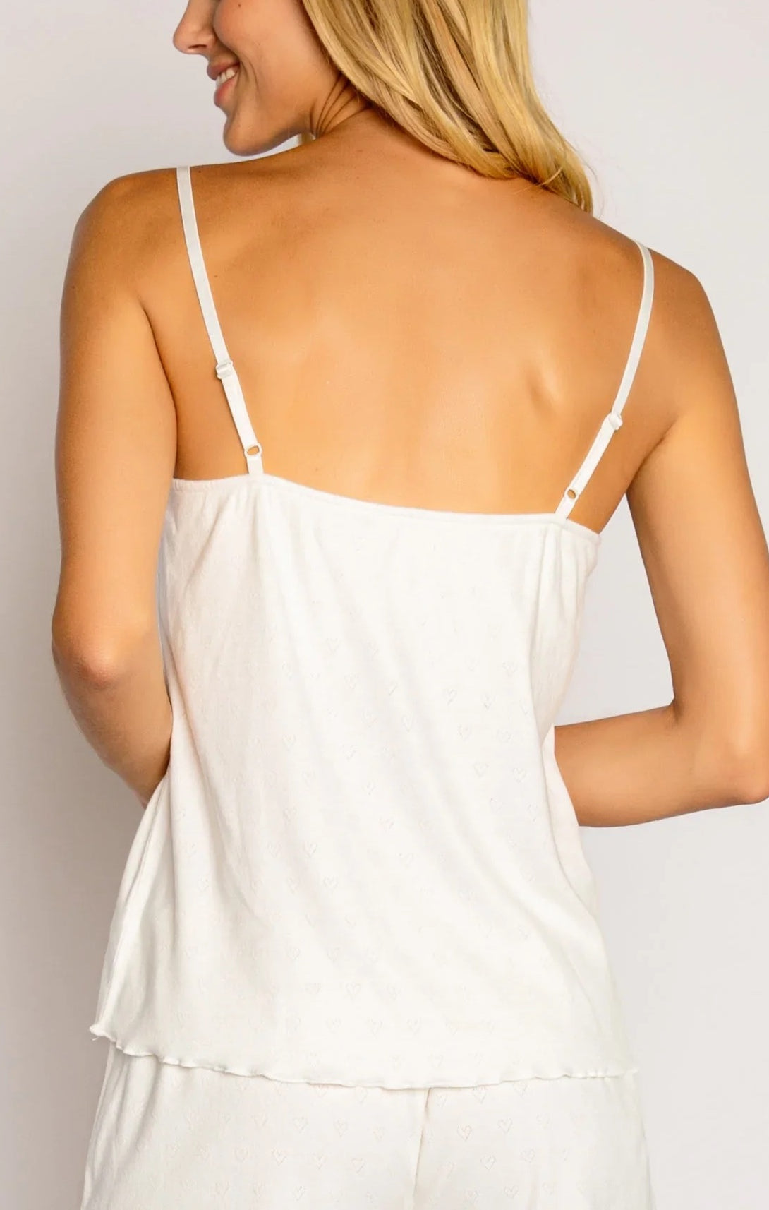 PJ Salvage Ivory Pointelle Hearts Tank Ivory. This sweet ivory sleep camisole in a soft brushed pointelle pattern featuring mini hearts with shelf mini rosette at neckline makes the perfect set with the matching hearts shorts.