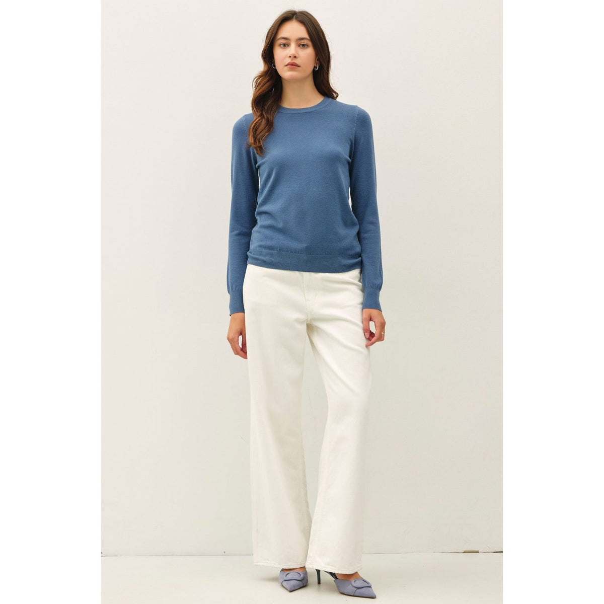 Women's sage crew neck knit sweater with long sleeves, ribbed hem and cuffs, and a relaxed fit