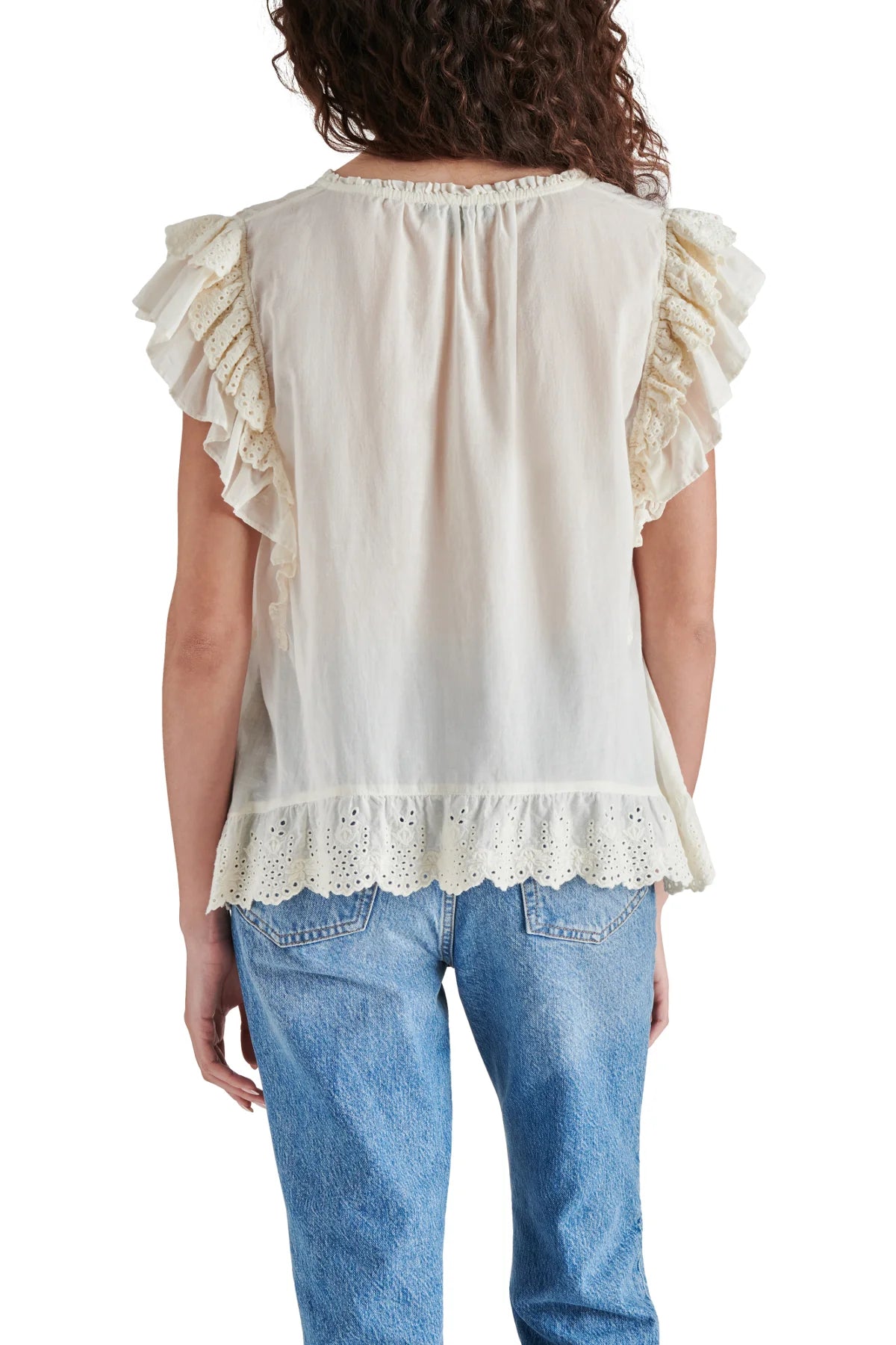 Steve Madden Bellamy Top Ivory. Set your boho spirit free in this breezy cotton top designed with eyelet-trimmed ruffles and a tassel-tie neck.