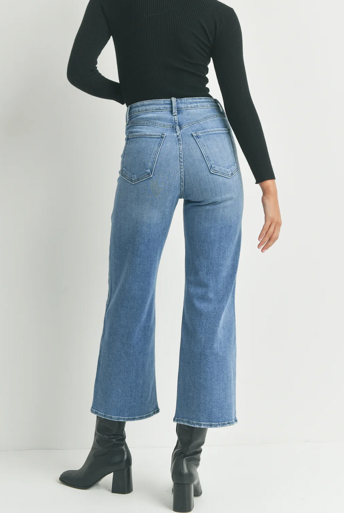 JBD Cargo Pocket Wide Leg Medium Blue Denim. Contemporary styles with 70s vibes combine to create the most comfortable, figure-flattering jeans. These wide-leg jeans feature patch pockets and a zip front closure for an all-out vintage inspired look.