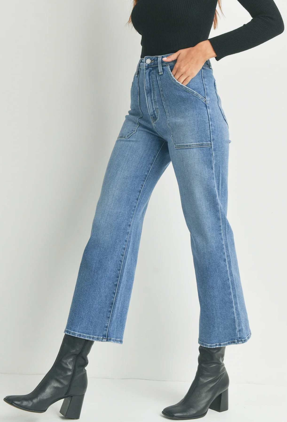 JBD Cargo Pocket Wide Leg Medium Blue Denim. Contemporary styles with 70s vibes combine to create the most comfortable, figure-flattering jeans. These wide-leg jeans feature patch pockets and a zip front closure for an all-out vintage inspired look.