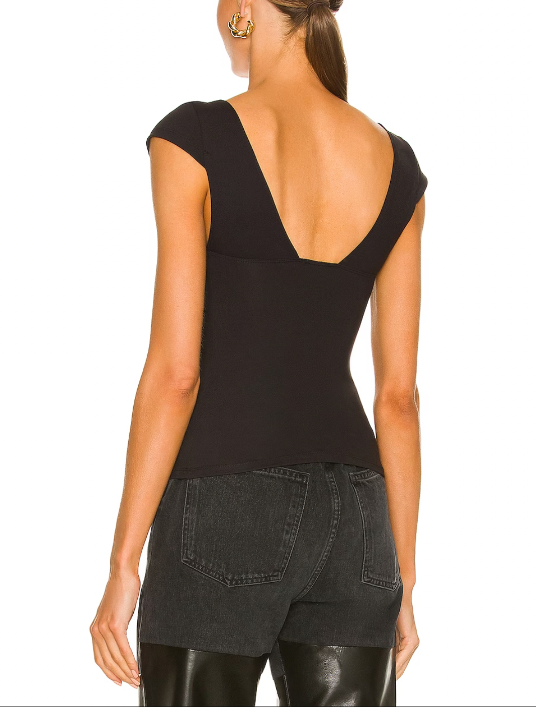 Free People Duo Corset Cami Black. One part bra, one part cami, this corset-inspired style features a deep sweetheart neckline with capped sleeves and seamed cup design, featured in an innovative, sculpting duo fabric that enhances your natural shape with a compressive (never constricting!) mesh underlayer.