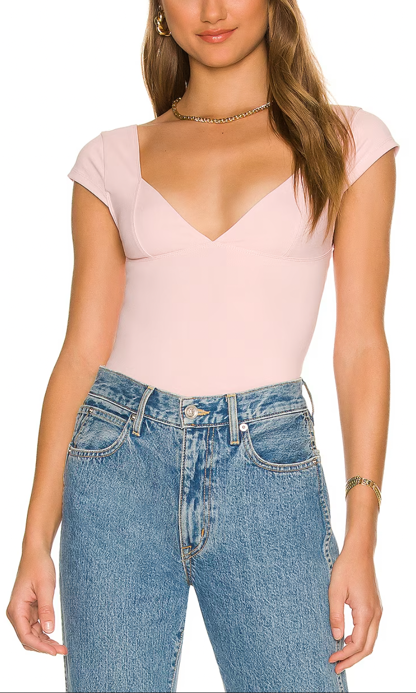 Free People Duo Corset Cami Ballet. One part bra, one part cami, this corset-inspired style features a deep sweetheart neckline with capped sleeves and seamed cup design, featured in an innovative, sculpting duo fabric that enhances your natural shape with a compressive (never constricting!) mesh underlayer.