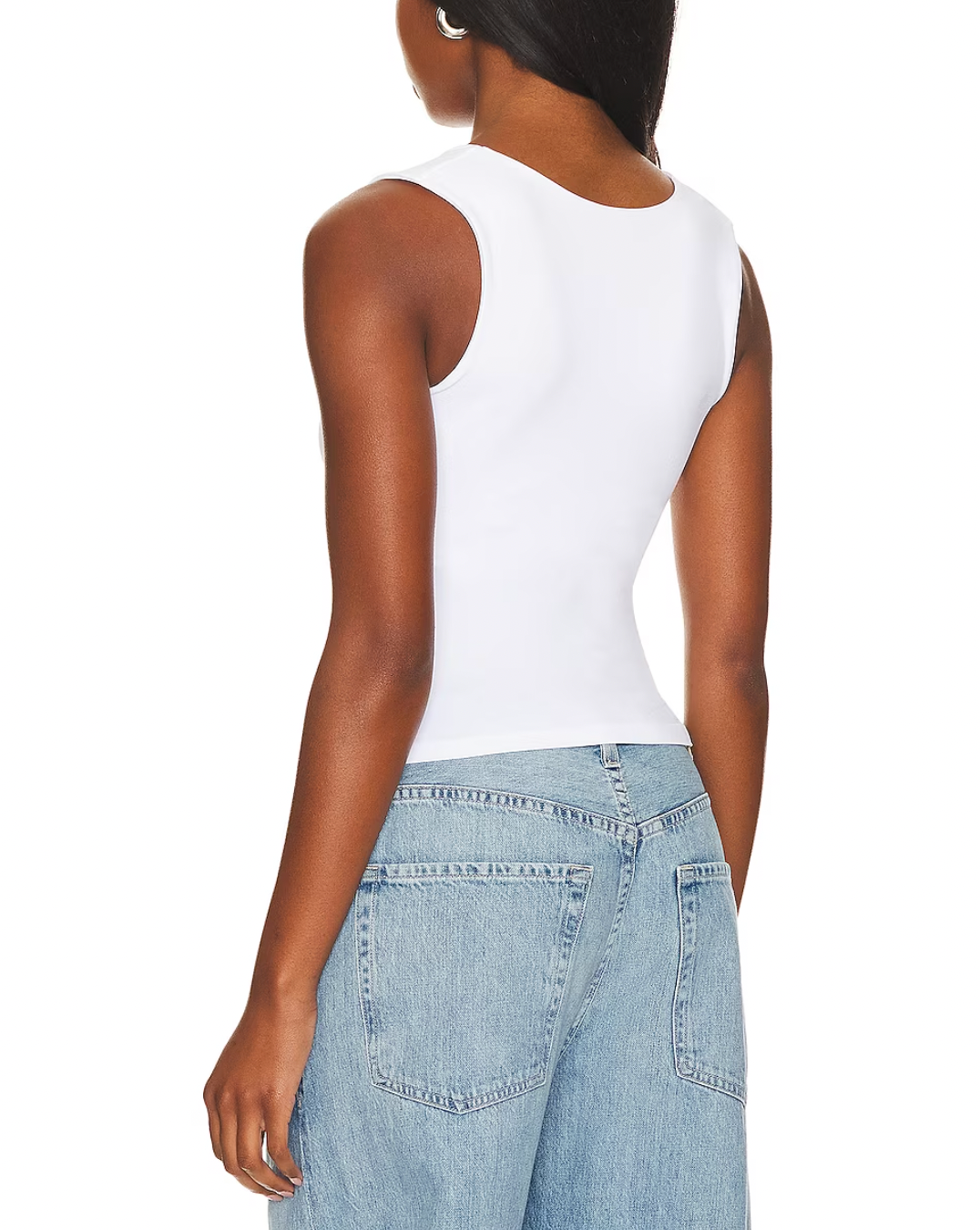 Free People Clean Lines Muscle Cami White. A new addition to your favorite seamless collection. This sleek tank is featured in a buttery soft fabrication with a scoop-neckline and sleeveless silhouette is a must have basic.