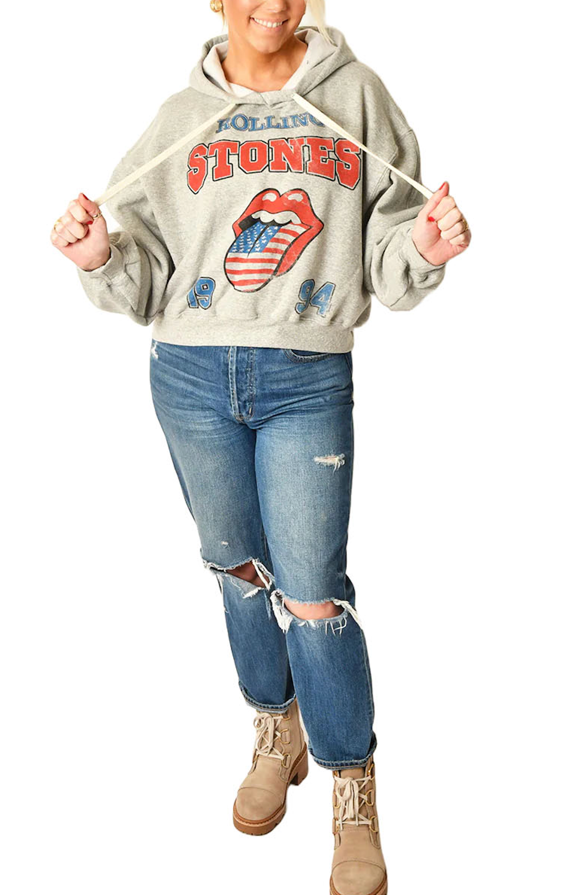 Rolling Stones Hoodie Heather Grey. Embrace the spirit of rock history with The Rolling Stones USA 1994 Hoodie. This hoodie provides cozy comfort while making a sustainable statement. It's a classic yet forward-thinking addition to any collection, offering warmth for the cool moments and a salute to timeless tunes.