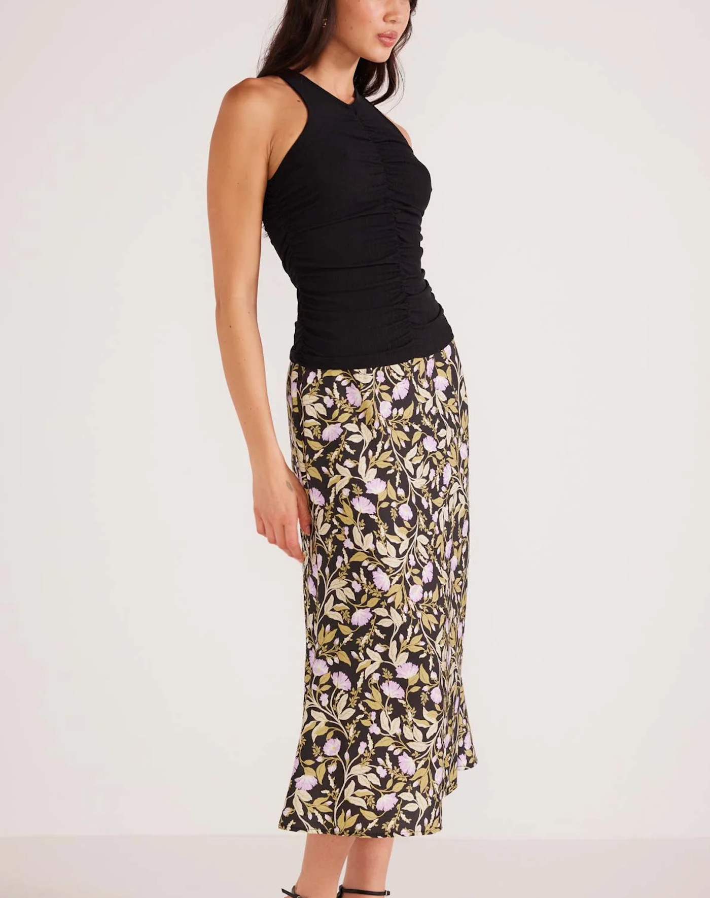 Mink Pink Louis Ruched Tank Black. The Louis Ruched Tank is the perfect styling piece that can either be used as a layer for those cooler months or by itself for when its warmer. Style with a printed bottom for a more elevated look or simple denim for a more 'off-duty' casual look.