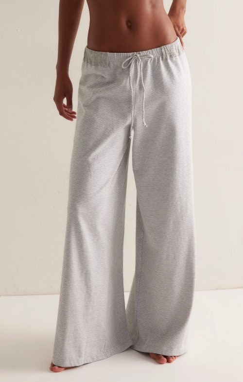 striped wide leg pants women, relaxed lounge pants boutique style, casual chic wide leg trousers women, comfy travel pants women boutique, elastic waist wide leg pants, everyday loungewear women fashion, effortless resort style pants women, soft relaxed fit trousers women, boutique lounge pants women, easy casual outfit bottoms women