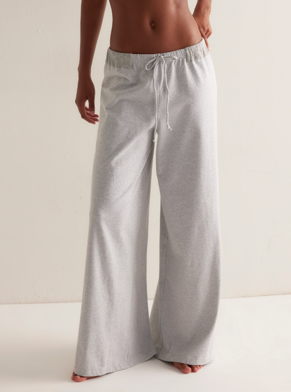 striped wide leg pants women, relaxed lounge pants boutique style, casual chic wide leg trousers women, comfy travel pants women boutique, elastic waist wide leg pants, everyday loungewear women fashion, effortless resort style pants women, soft relaxed fit trousers women, boutique lounge pants women, easy casual outfit bottoms women
