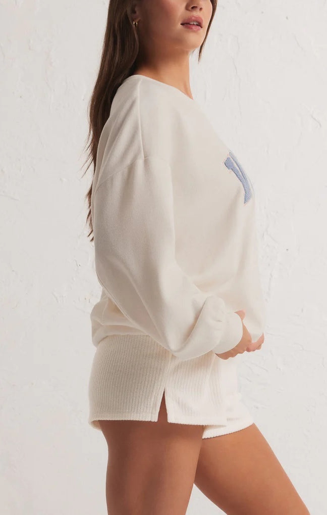 Z Supply Oversized Vacay Sweatshirt White. Planning a vacay? Grab the Oversized Vacay Sweatshirt and stay comfy on your flight or road trip. This classic crew pullover is also perfect for staycations or lounging around the house. Throw it on over denim and this top easily creates a comfy casual look.