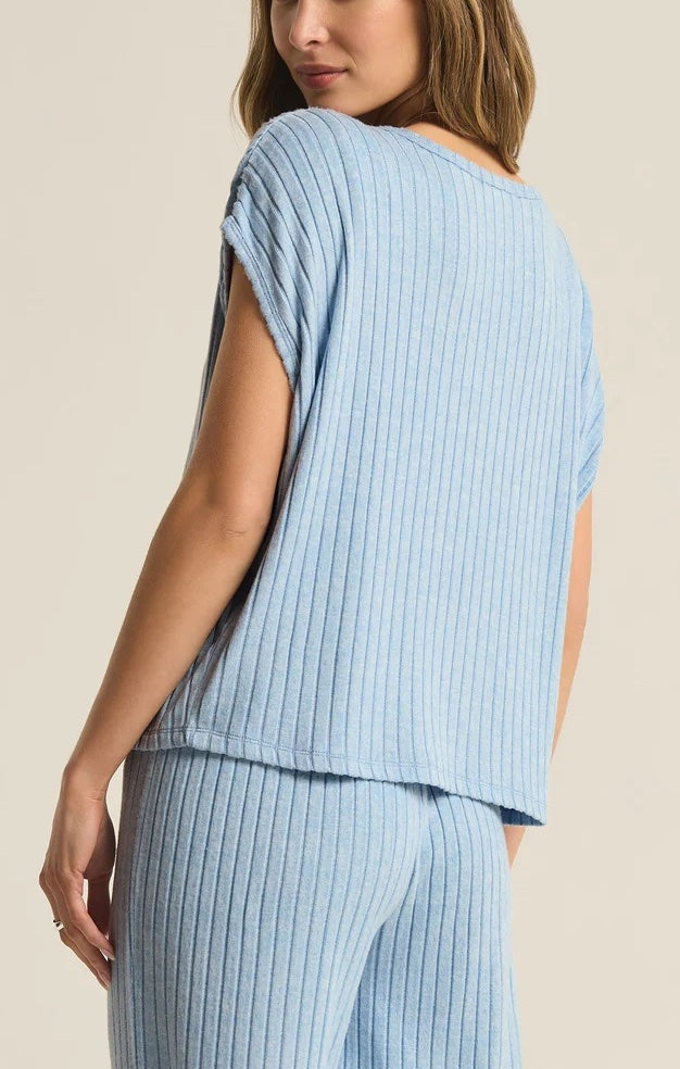 Z Supply Shoreline Rib Top Blue Jay. Dress yourself in the dreamy softness of your new favorite lounge top. The relaxed fit of the Shoreline Rib Top and classic crew neck style make it easy to wear year-round.