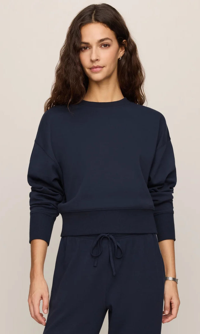 Relaxed crewneck sweatshirt with dropped shoulders, long sleeves, and ribbed trim.