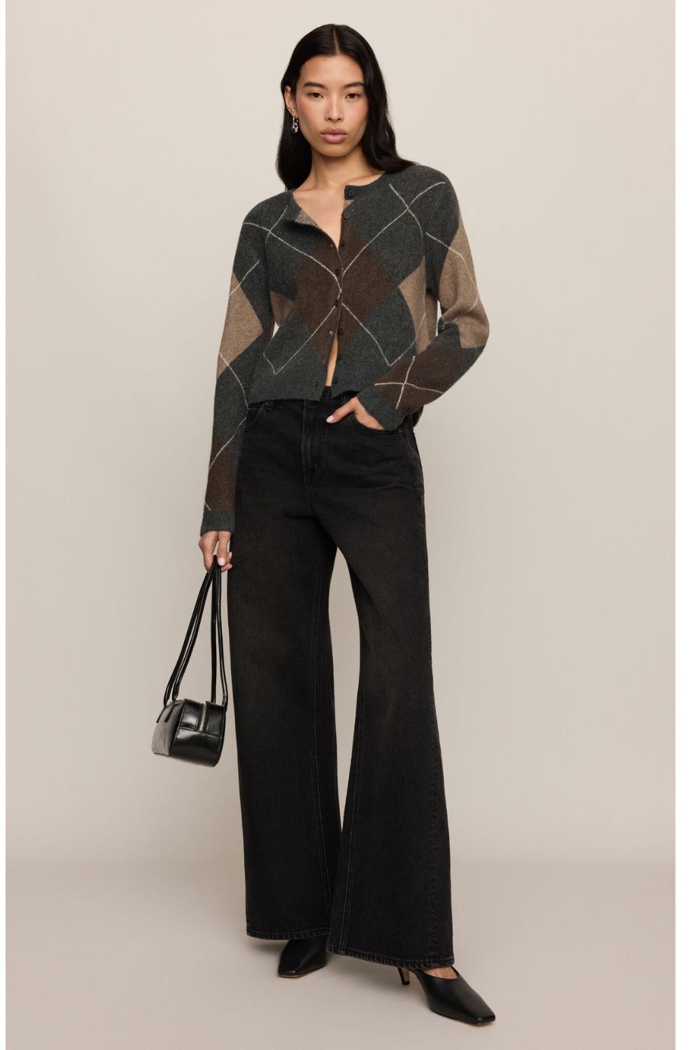 Medina Stripe Cardigan with crew neckline, long sleeves, and button-front closure.