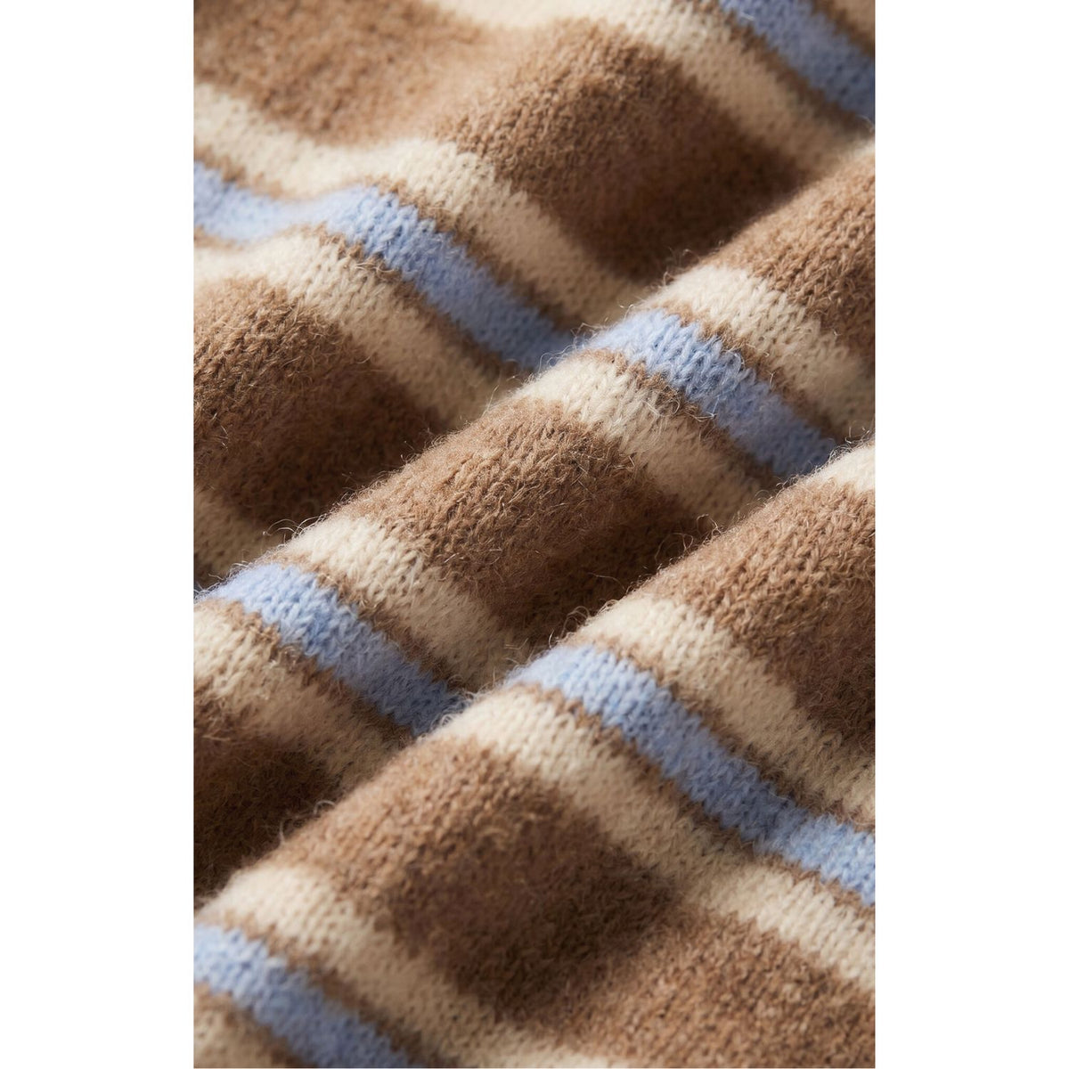 Medina Stripe Cardigan is striped button-front cardigan with crew neckline and long sleeves