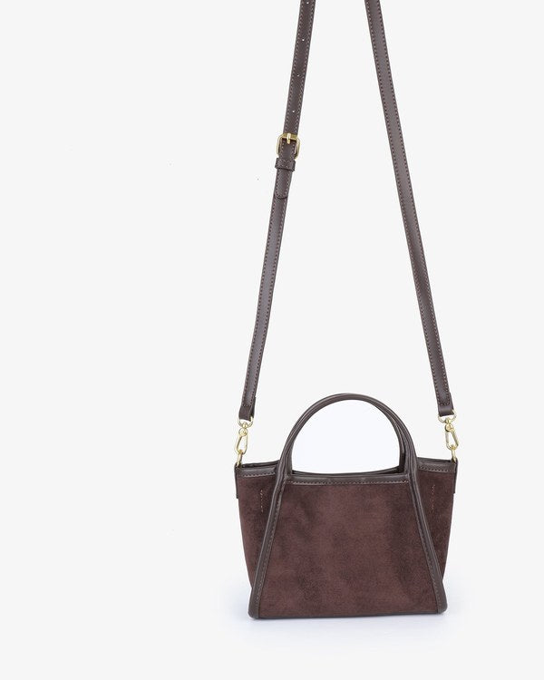 Remi & Reid Gillie Mini Satchel in Chocolate, with crossbody strap attached, front view