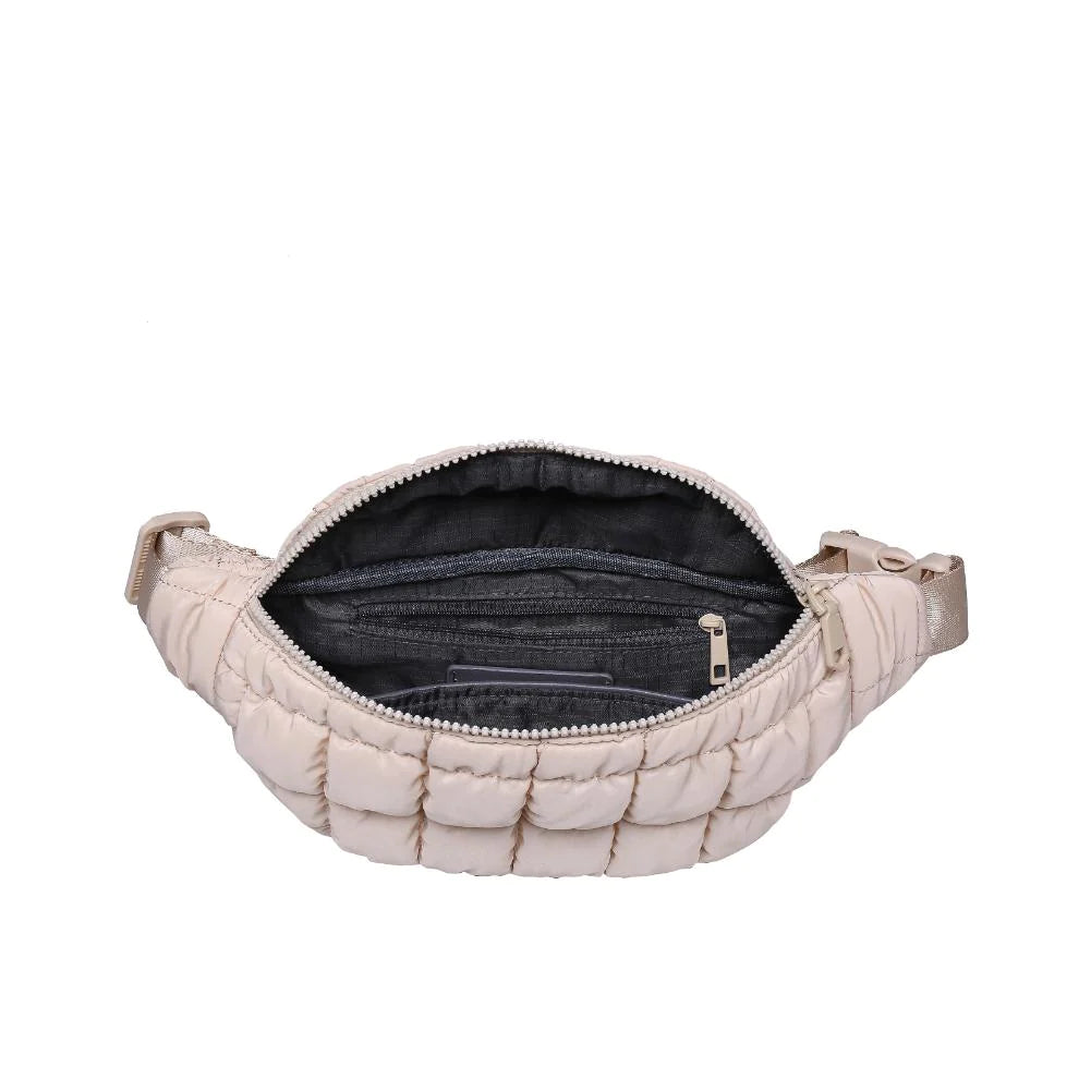 Sol & Selene Resurgence Belt Bag Cream. Embrace the bounce-back spirit with our Resurgence belt bag, featuring a quilted puff design for an on-trend, chic look, perfect for hands-free convenience while revitalizing your outfit with its unique charm and functional flair. Keep all your essentials handy and organized.