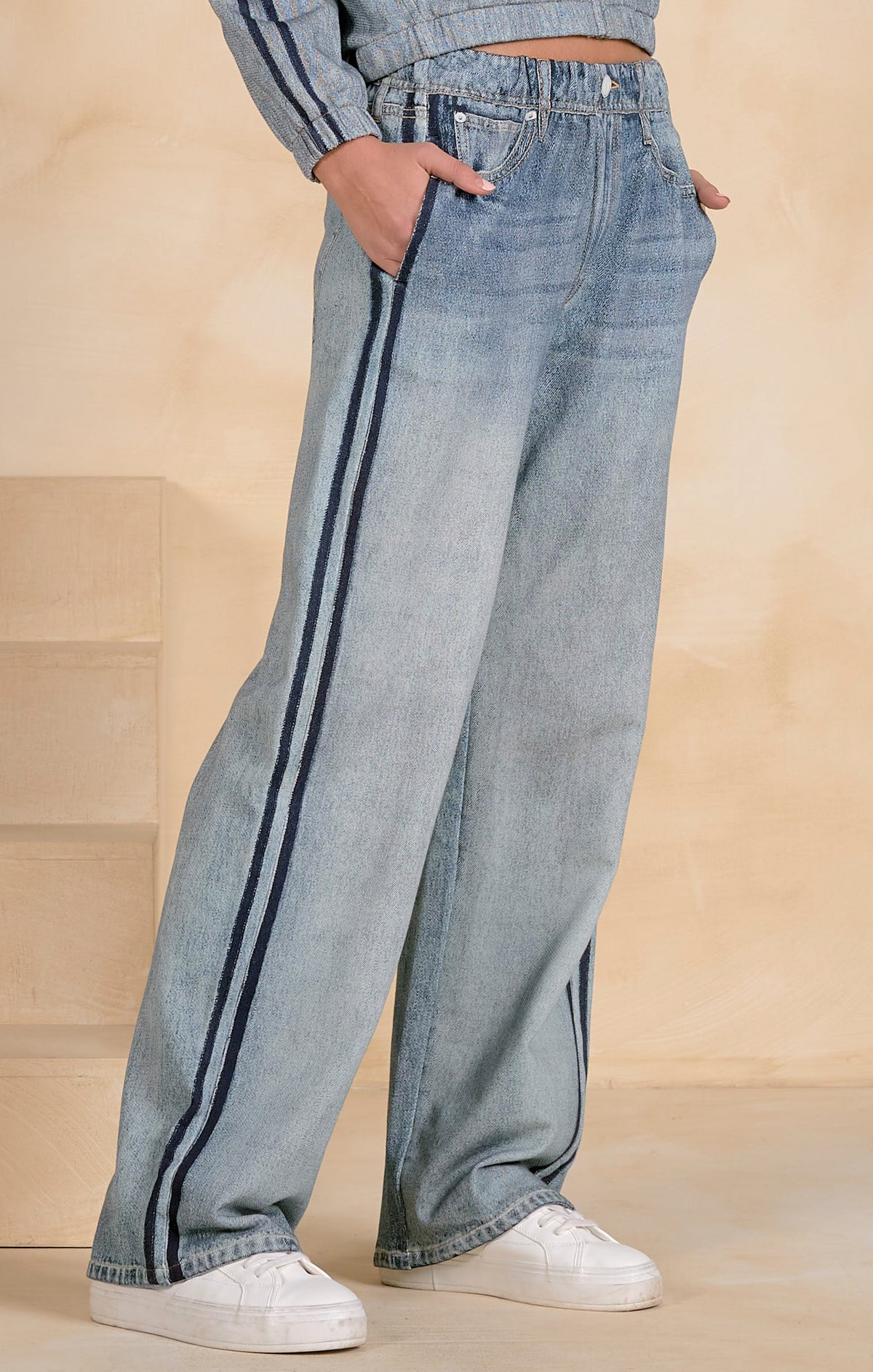 wide leg stripe jeans, women’s sporty denim, side stripe jeans women, relaxed fit wide leg jeans, boutique statement denim, trendy wide leg pants, elevated casual jeans, sporty chic denim, lightweight wide leg jeans, fashion forward denim